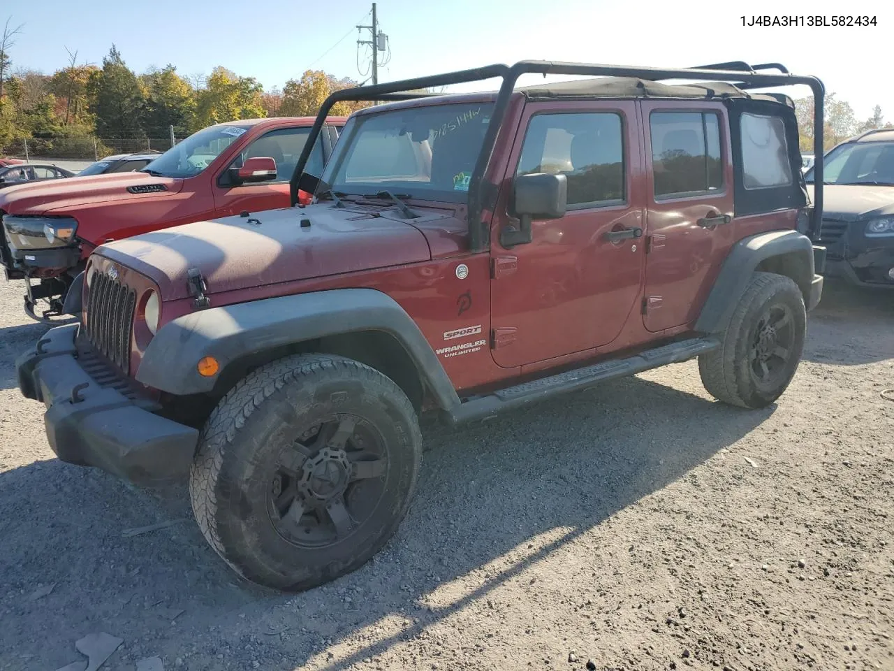 2011 Jeep Wrangler Unlimited Sport VIN: 1J4BA3H13BL582434 Lot: 77185144