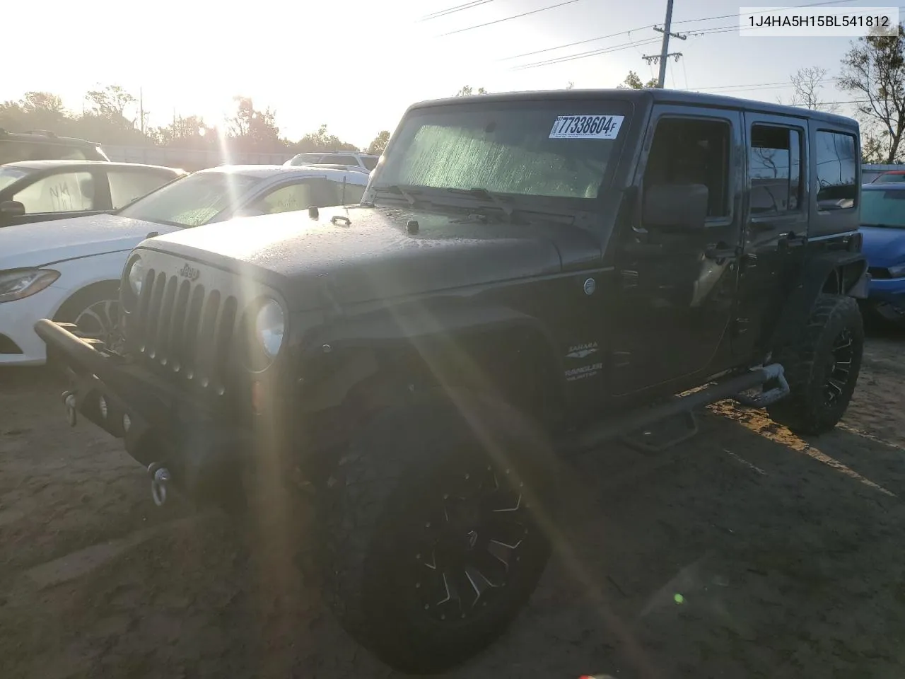 2011 Jeep Wrangler Unlimited Sahara VIN: 1J4HA5H15BL541812 Lot: 77338604