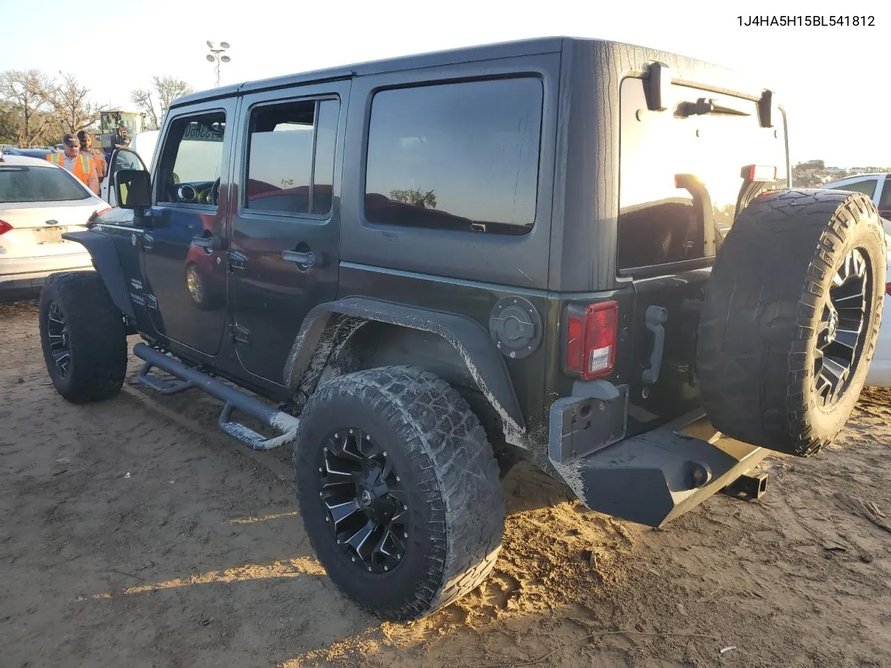 2011 Jeep Wrangler Unlimited Sahara VIN: 1J4HA5H15BL541812 Lot: 77338604