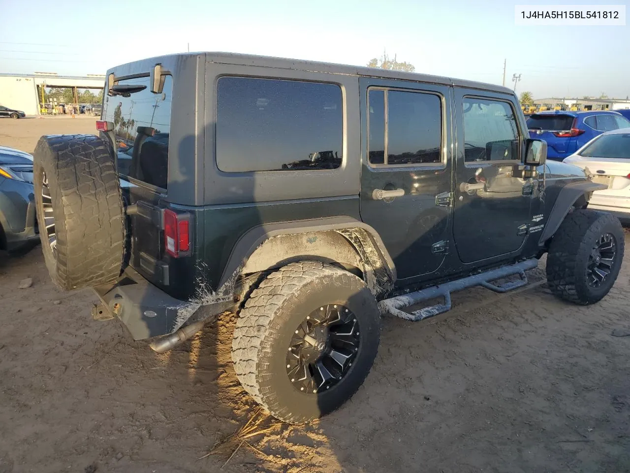 2011 Jeep Wrangler Unlimited Sahara VIN: 1J4HA5H15BL541812 Lot: 77338604