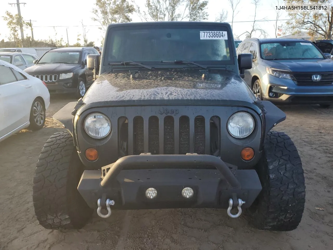 2011 Jeep Wrangler Unlimited Sahara VIN: 1J4HA5H15BL541812 Lot: 77338604