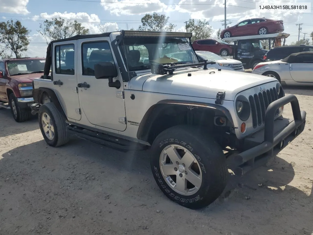 2011 Jeep Wrangler Unlimited Sport VIN: 1J4BA3H15BL581818 Lot: 77412954