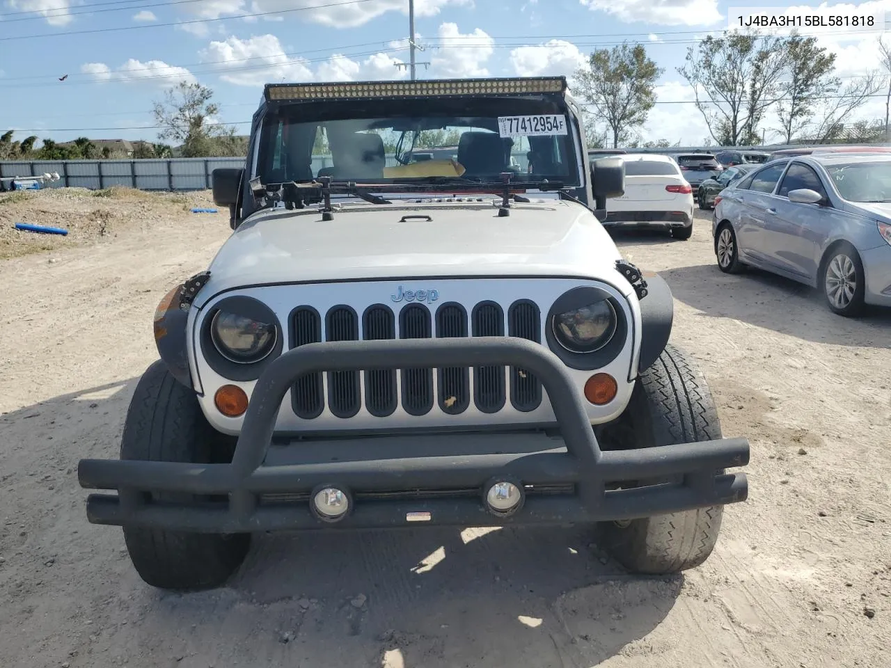 2011 Jeep Wrangler Unlimited Sport VIN: 1J4BA3H15BL581818 Lot: 77412954