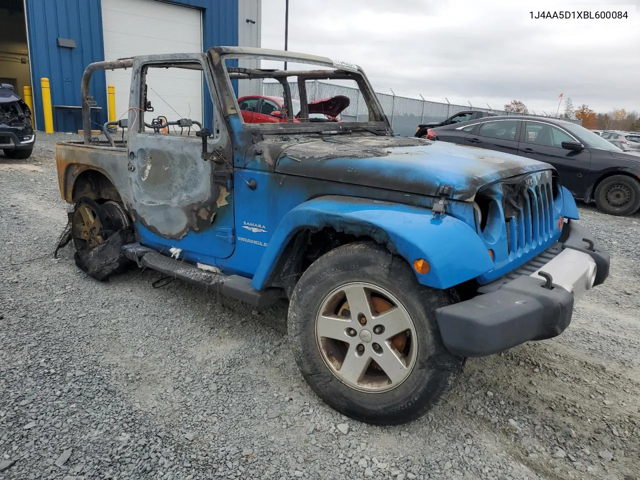 2011 Jeep Wrangler Sahara VIN: 1J4AA5D1XBL600084 Lot: 77548204