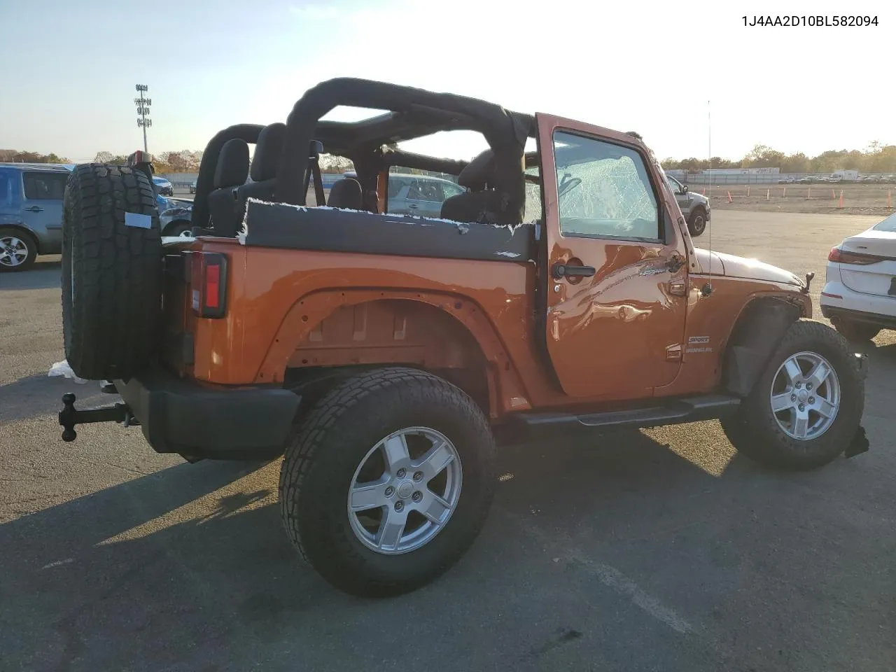 2011 Jeep Wrangler Sport VIN: 1J4AA2D10BL582094 Lot: 77644834