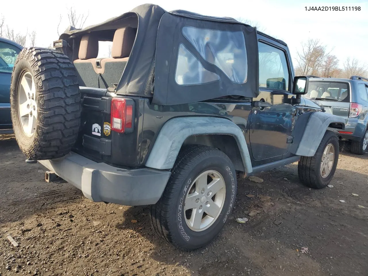 2011 Jeep Wrangler Sport VIN: 1J4AA2D19BL511198 Lot: 78606314