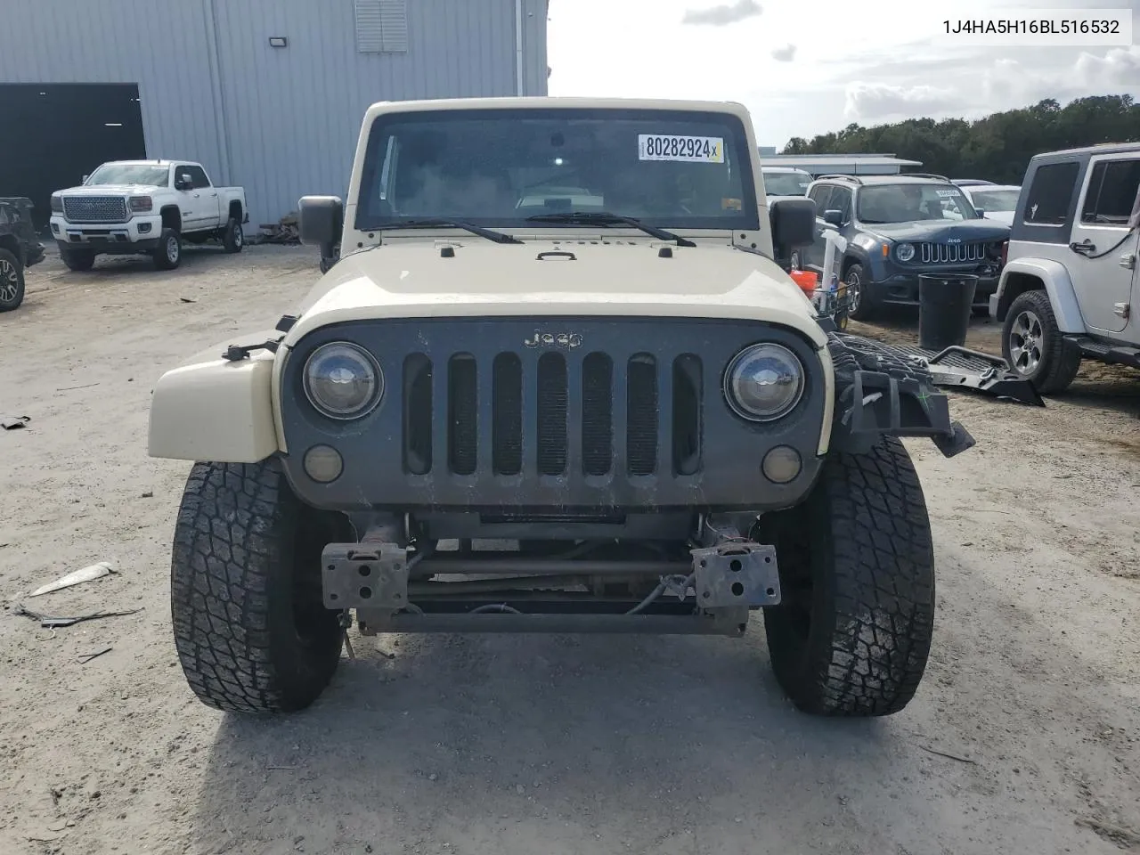 2011 Jeep Wrangler Unlimited Sahara VIN: 1J4HA5H16BL516532 Lot: 80282924