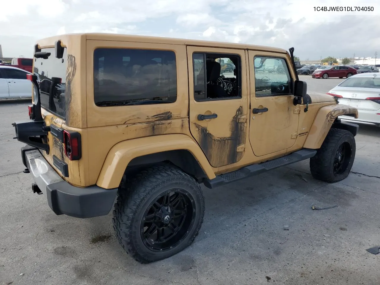 2013 Jeep Wrangler Unlimited Sahara VIN: 1C4BJWEG1DL704050 Lot: 59996534