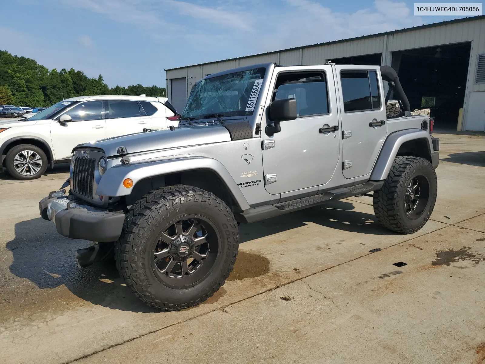 1C4HJWEG4DL705056 2013 Jeep Wrangler Unlimited Sahara