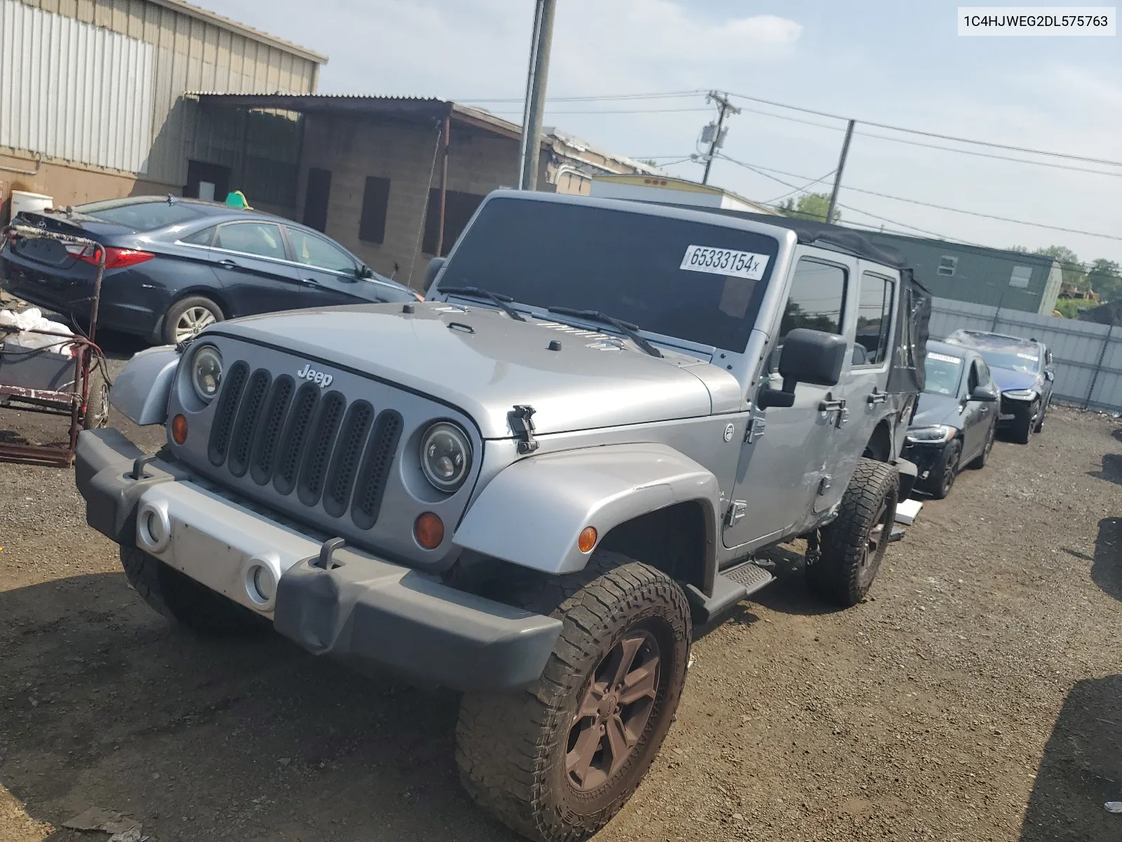 2013 Jeep Wrangler Unlimited Sahara VIN: 1C4HJWEG2DL575763 Lot: 65333154