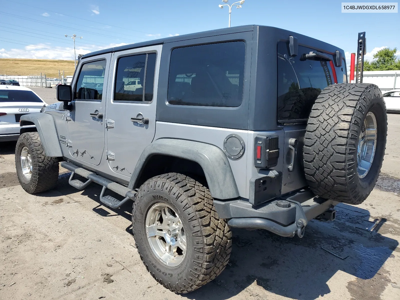 1C4BJWDGXDL658977 2013 Jeep Wrangler Unlimited Sport