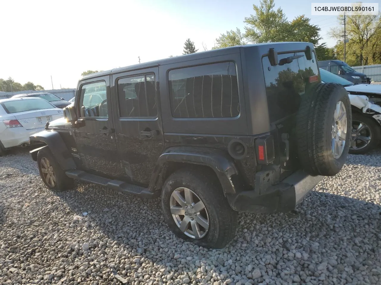 2013 Jeep Wrangler Unlimited Sahara VIN: 1C4BJWEG8DL590161 Lot: 66765104