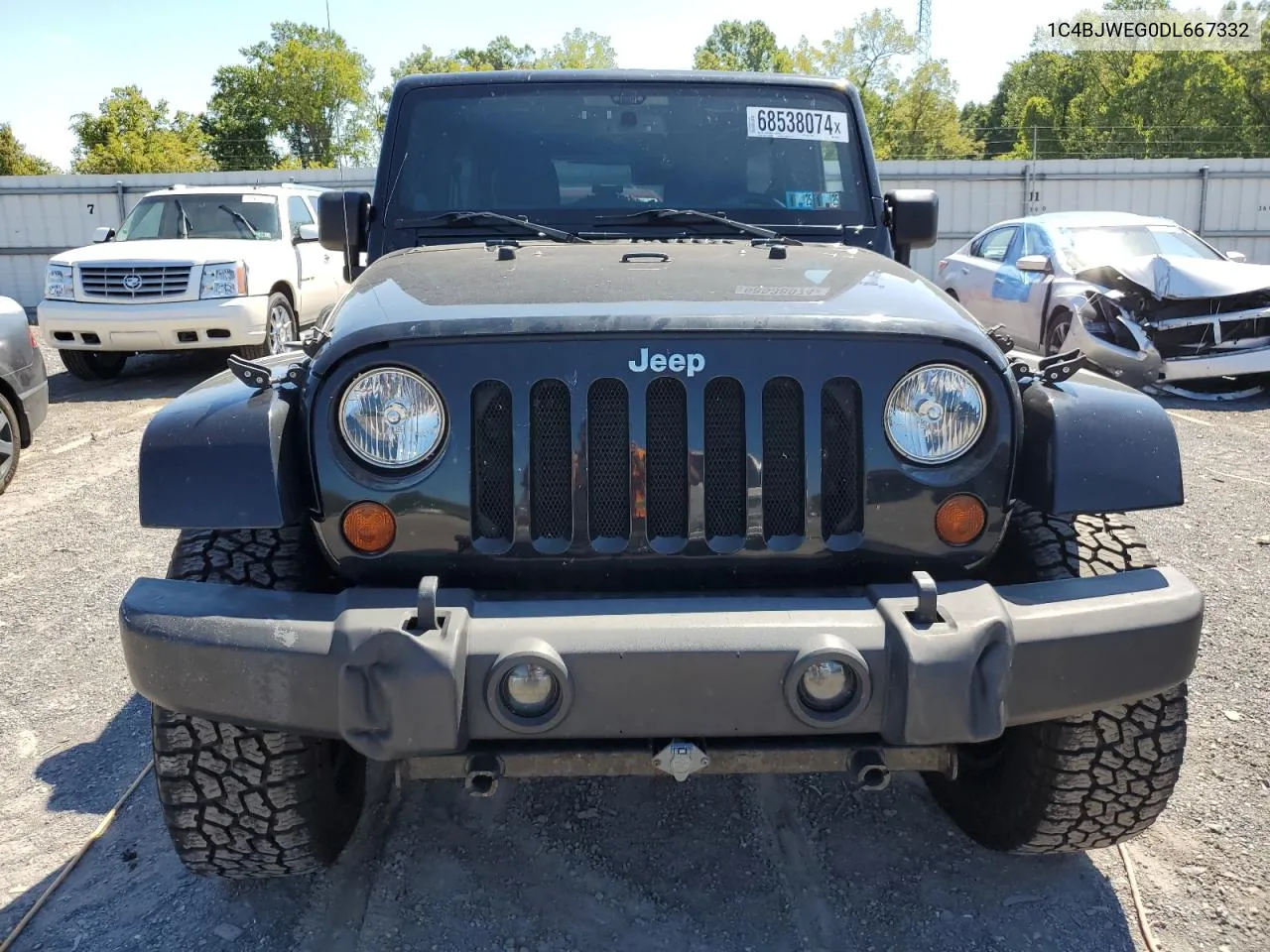 2013 Jeep Wrangler Unlimited Sahara VIN: 1C4BJWEG0DL667332 Lot: 68538074