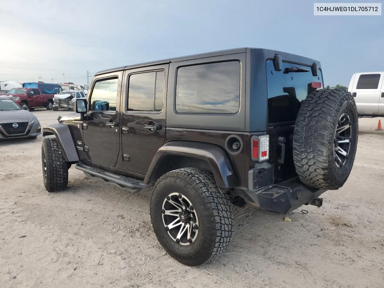 2013 Jeep Wrangler Unlimited Sahara VIN: 1C4HJWEG1DL705712 Lot: 69132724