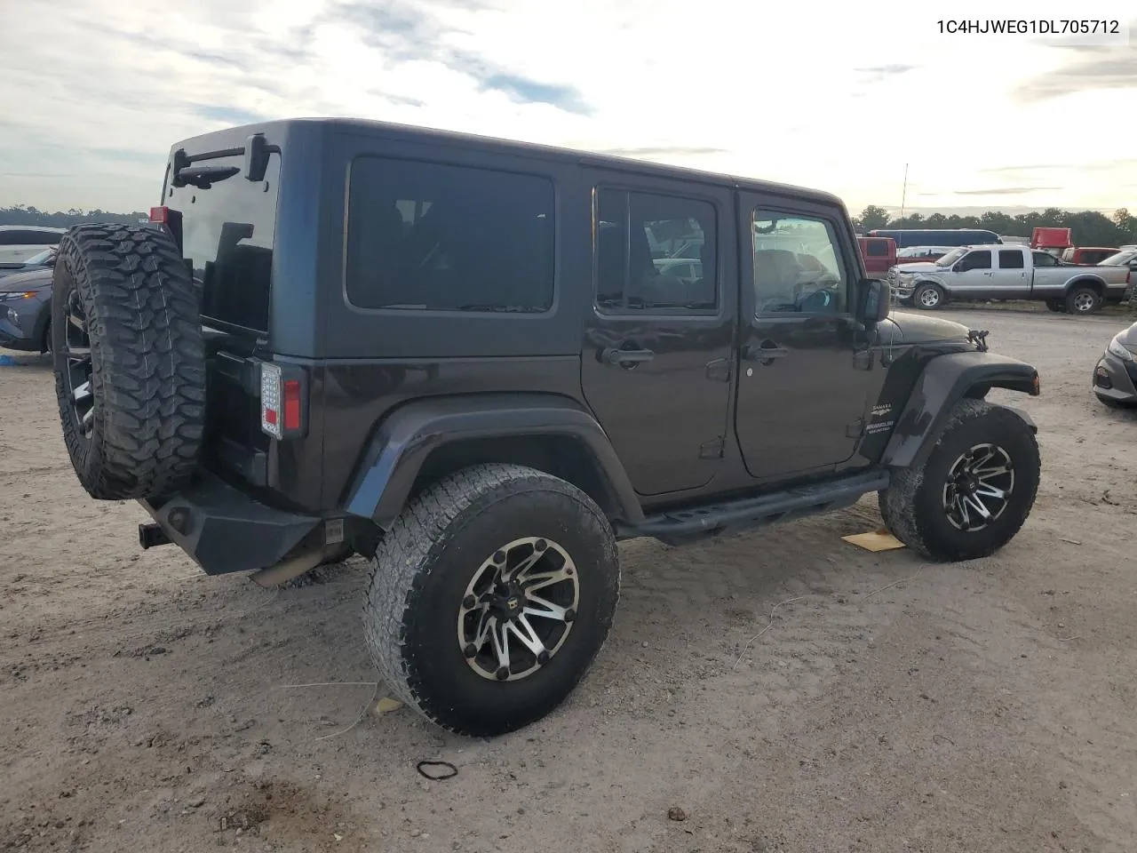 2013 Jeep Wrangler Unlimited Sahara VIN: 1C4HJWEG1DL705712 Lot: 69132724