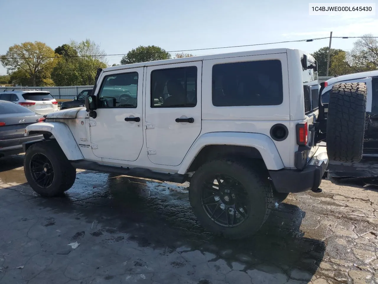 2013 Jeep Wrangler Unlimited Sahara VIN: 1C4BJWEG0DL645430 Lot: 70080884