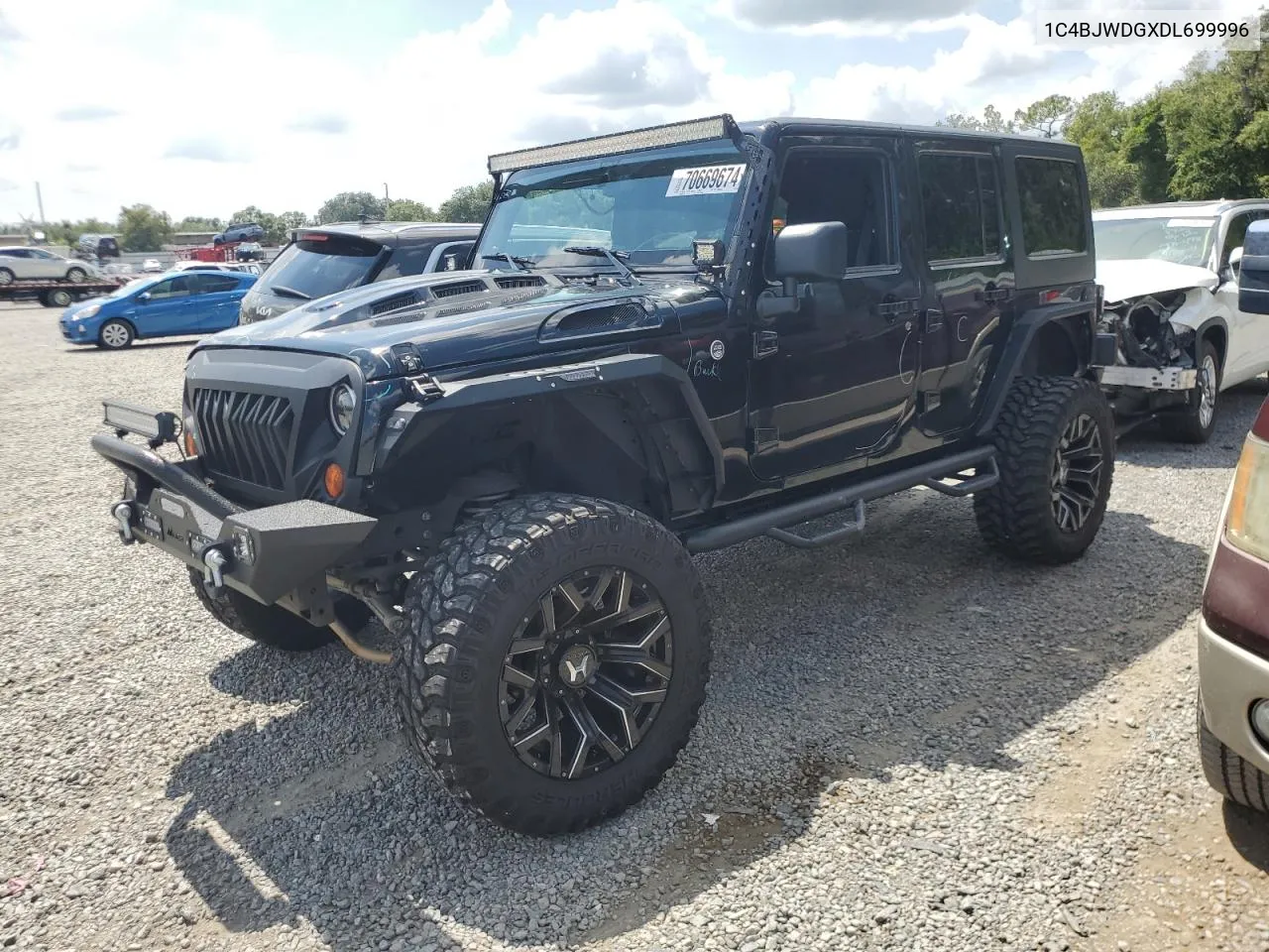 2013 Jeep Wrangler Unlimited Sport VIN: 1C4BJWDGXDL699996 Lot: 70669674