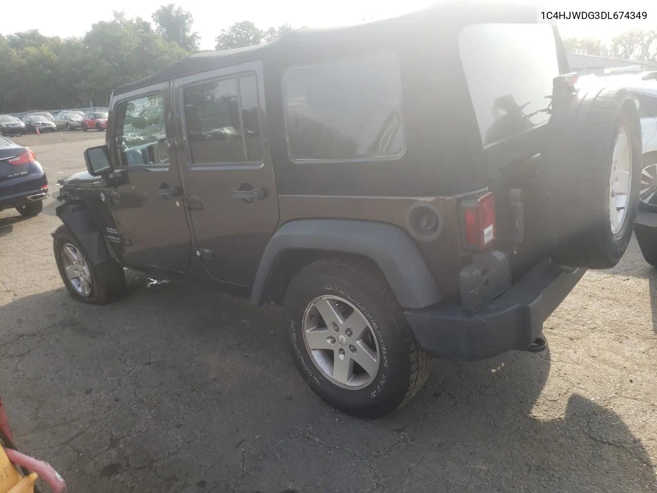 1C4HJWDG3DL674349 2013 Jeep Wrangler Unlimited Sport