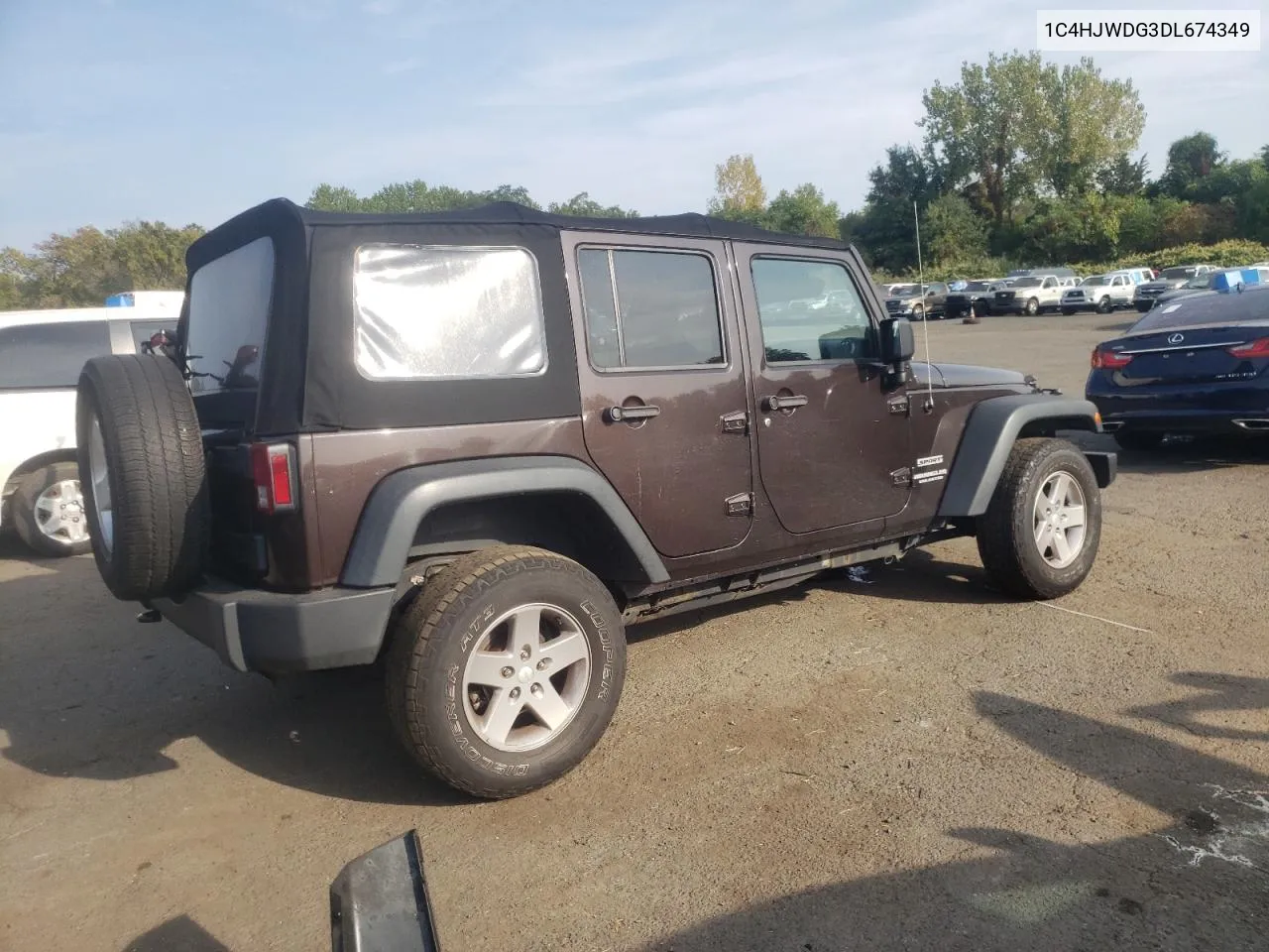 2013 Jeep Wrangler Unlimited Sport VIN: 1C4HJWDG3DL674349 Lot: 71555304