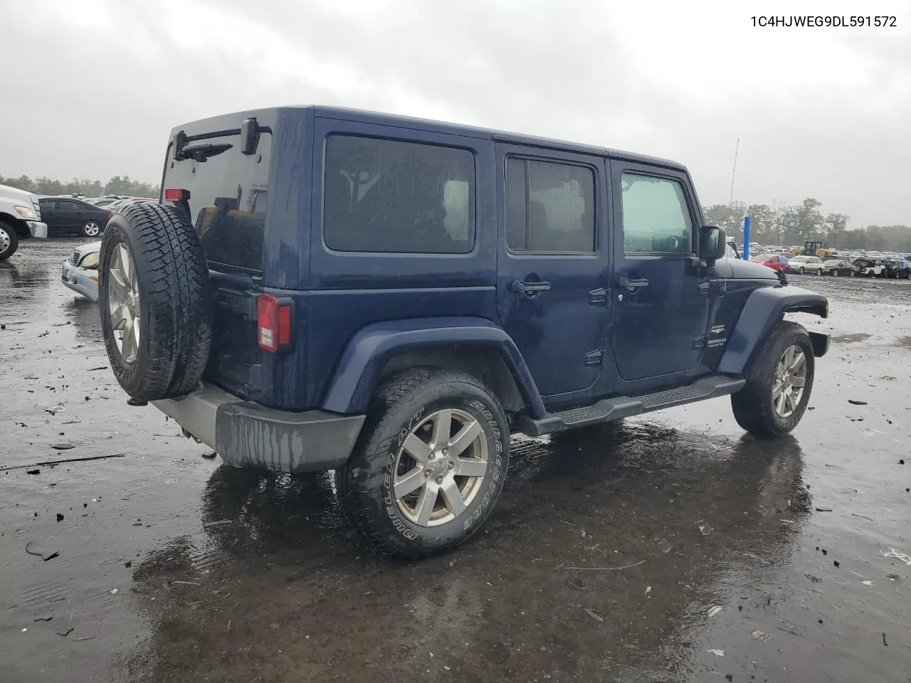 2013 Jeep Wrangler Unlimited Sahara VIN: 1C4HJWEG9DL591572 Lot: 71794974