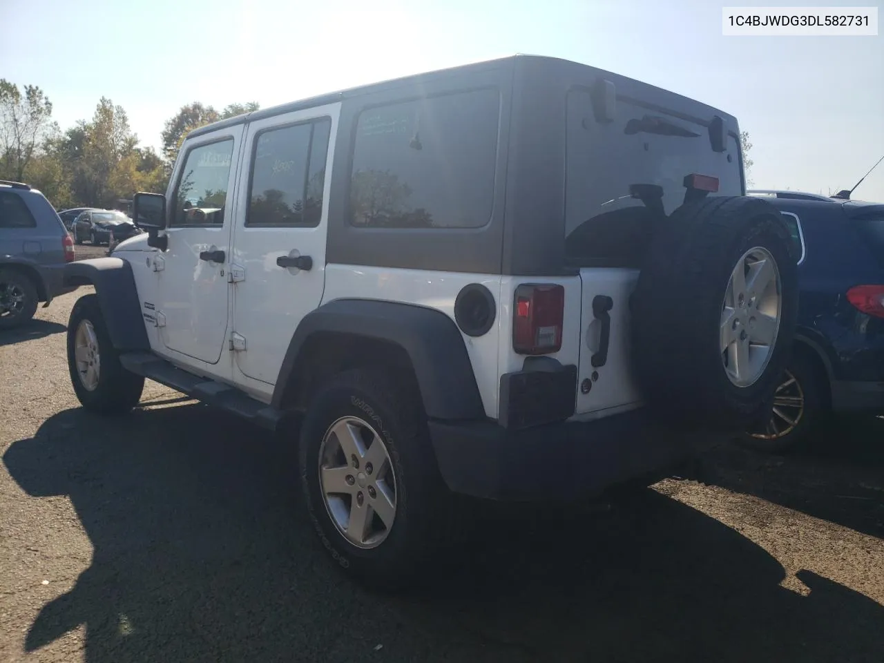 2013 Jeep Wrangler Unlimited Sport VIN: 1C4BJWDG3DL582731 Lot: 74062514