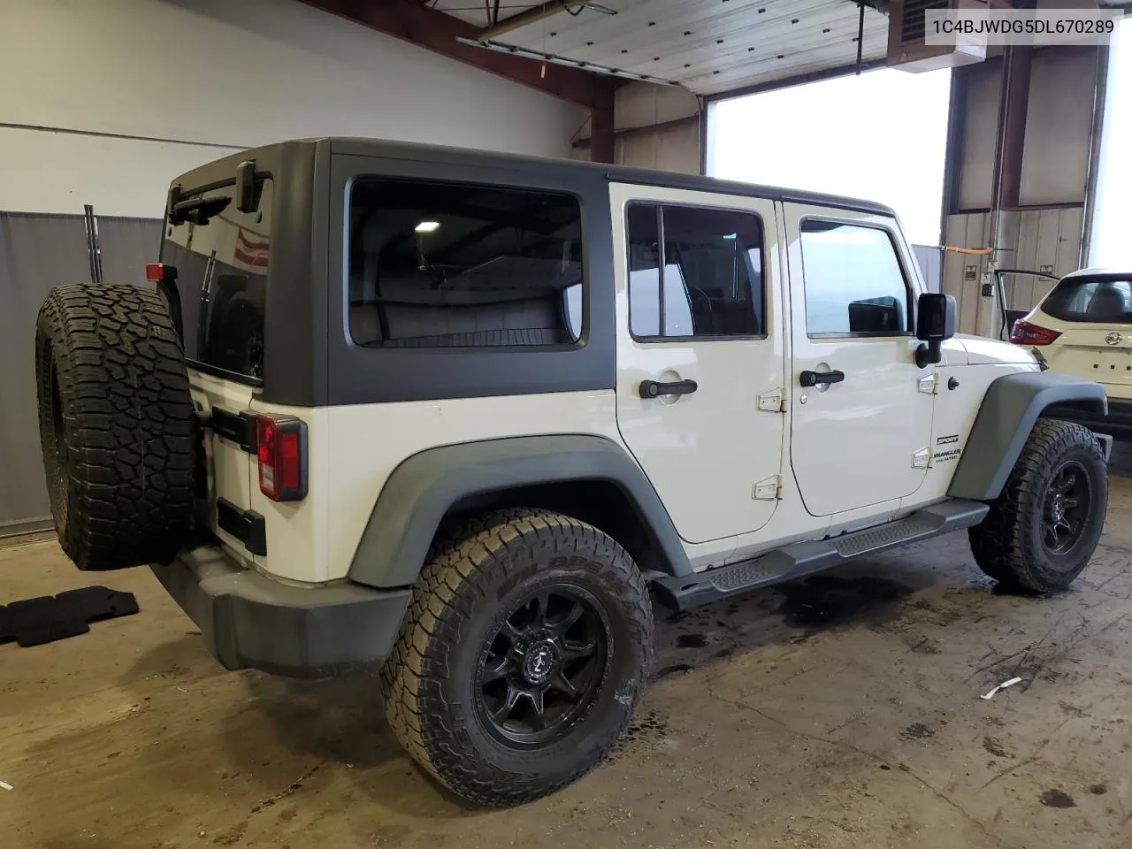 2013 Jeep Wrangler Unlimited Sport VIN: 1C4BJWDG5DL670289 Lot: 74099764