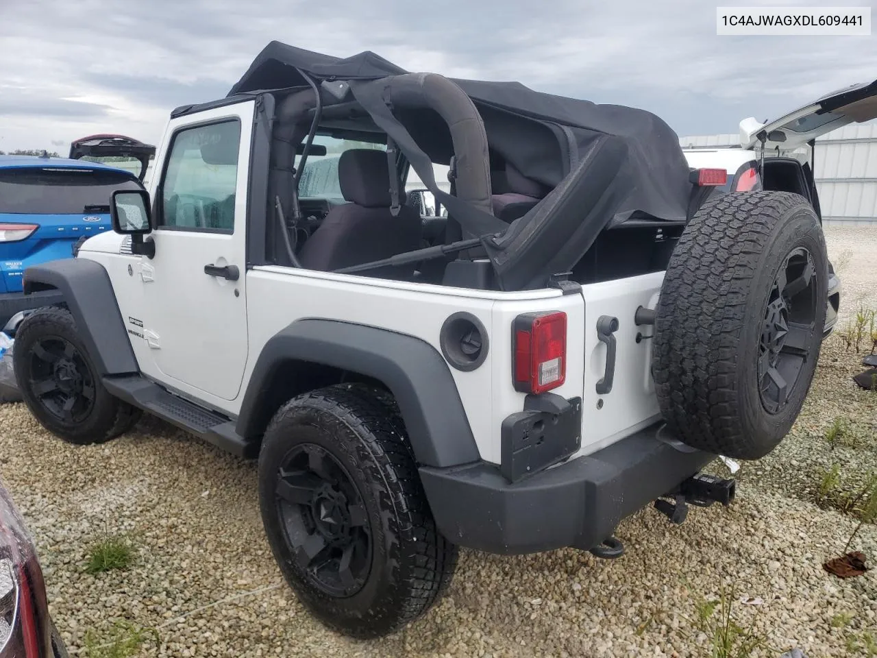 2013 Jeep Wrangler Sport VIN: 1C4AJWAGXDL609441 Lot: 74342144