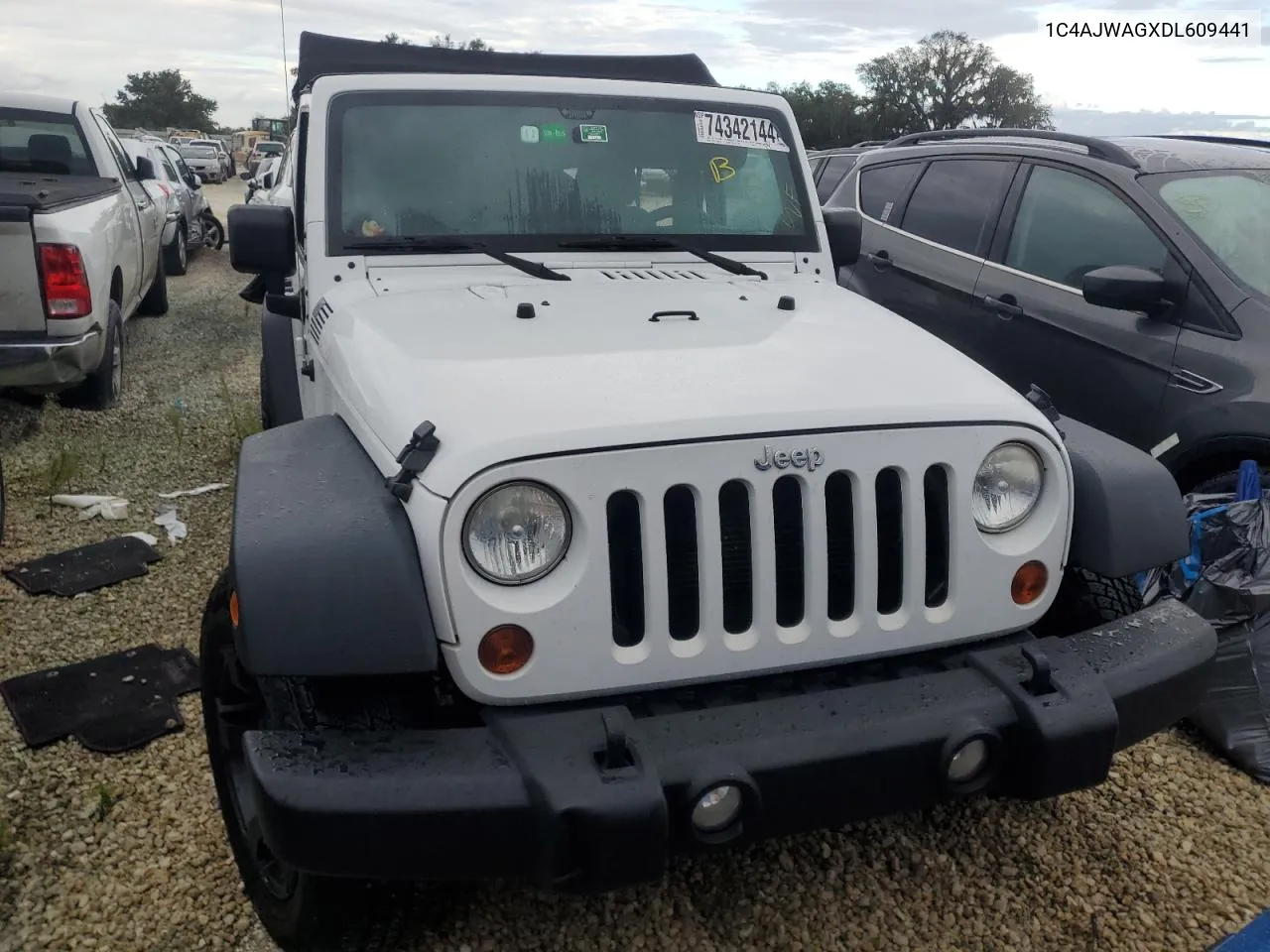 2013 Jeep Wrangler Sport VIN: 1C4AJWAGXDL609441 Lot: 74342144