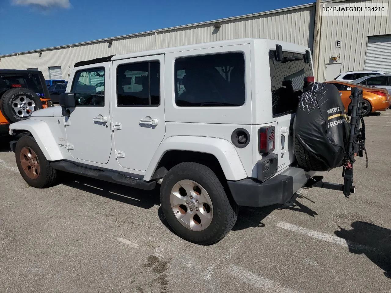 2013 Jeep Wrangler Unlimited Sahara VIN: 1C4BJWEG1DL534210 Lot: 75091364