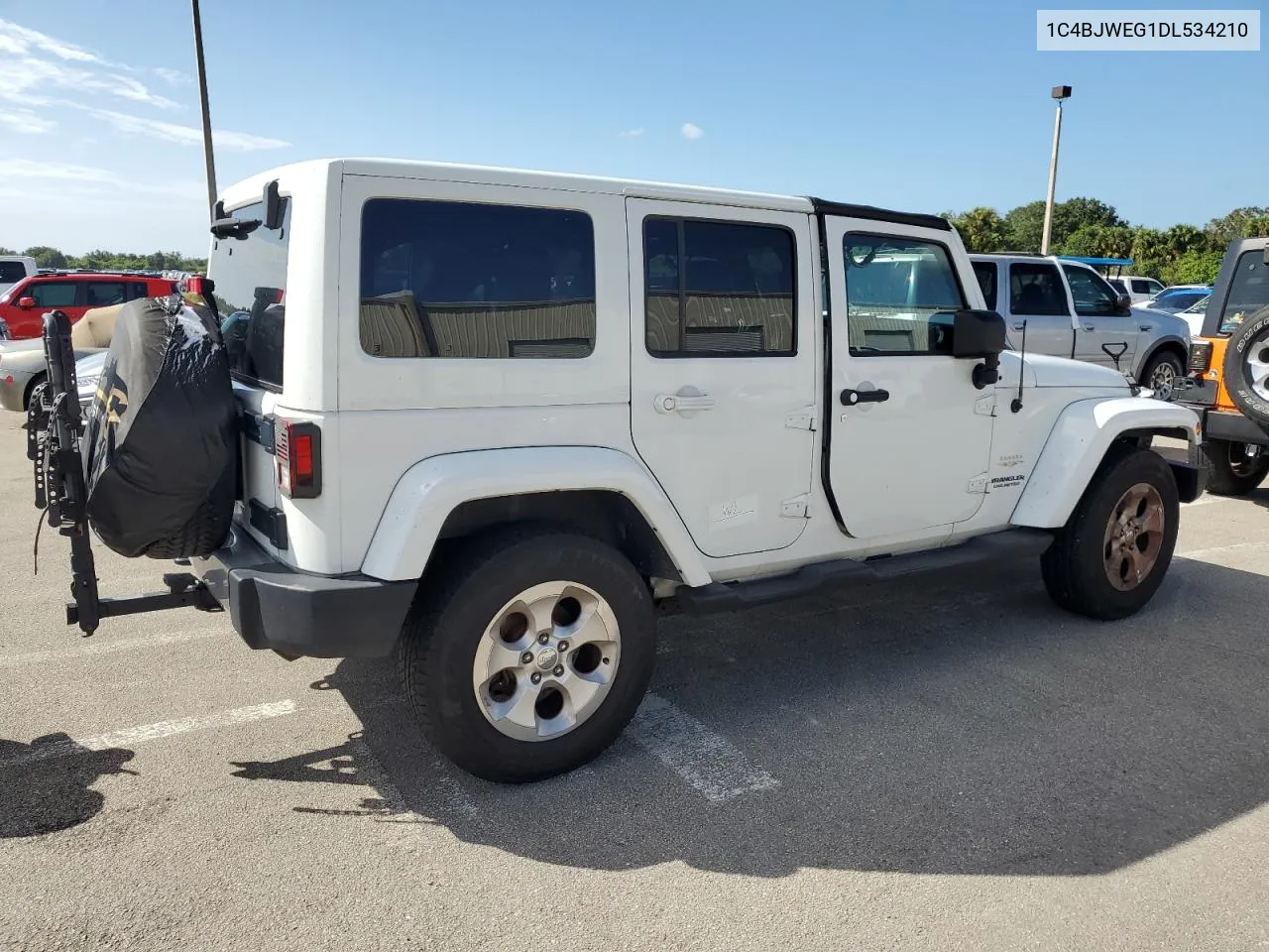 2013 Jeep Wrangler Unlimited Sahara VIN: 1C4BJWEG1DL534210 Lot: 75091364