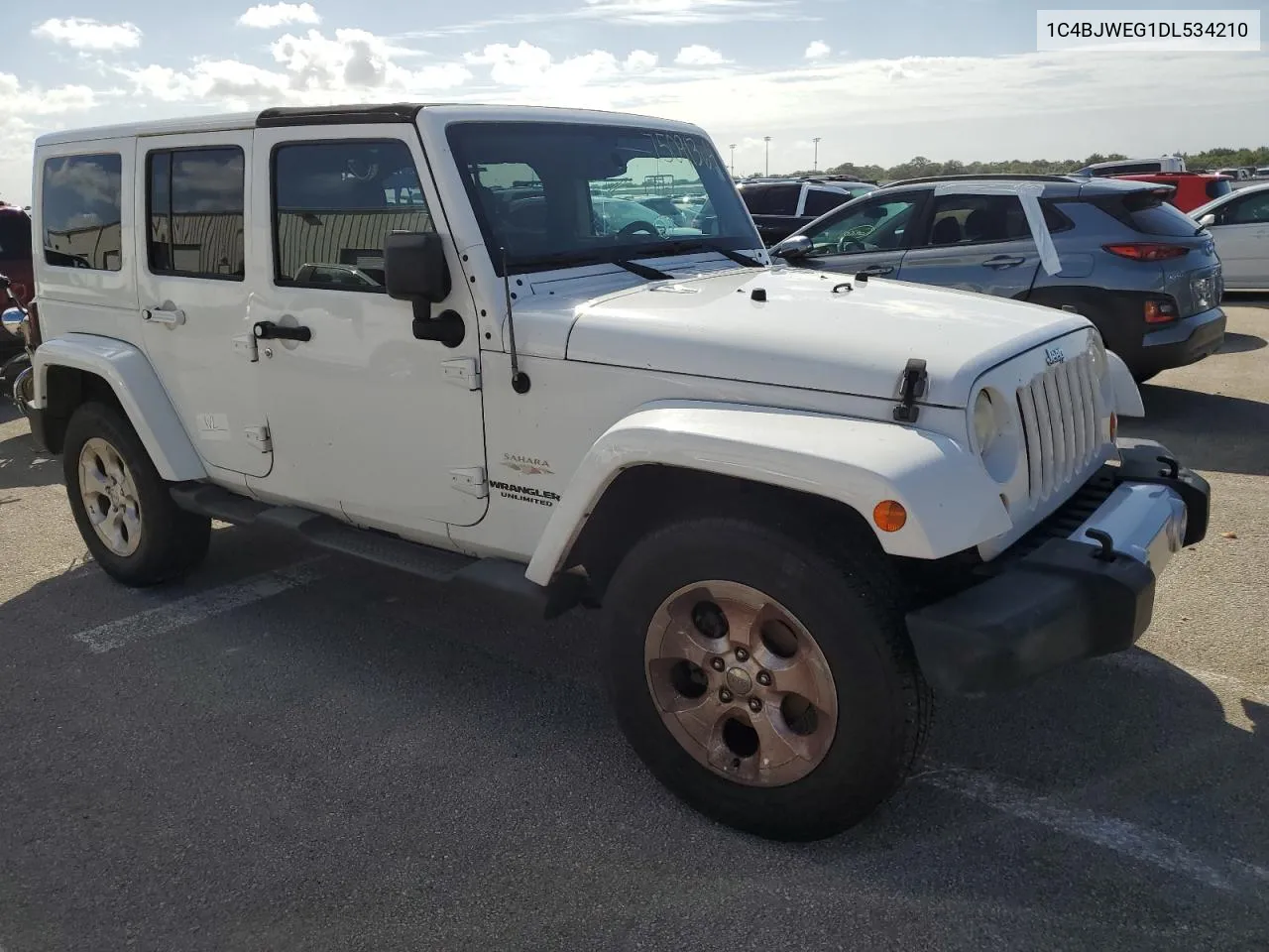 2013 Jeep Wrangler Unlimited Sahara VIN: 1C4BJWEG1DL534210 Lot: 75091364