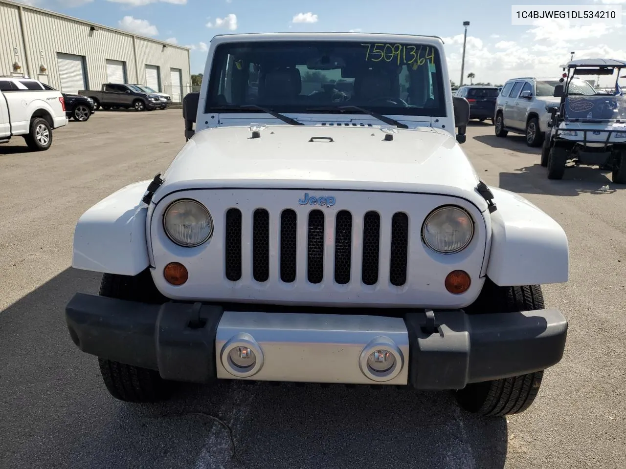 2013 Jeep Wrangler Unlimited Sahara VIN: 1C4BJWEG1DL534210 Lot: 75091364