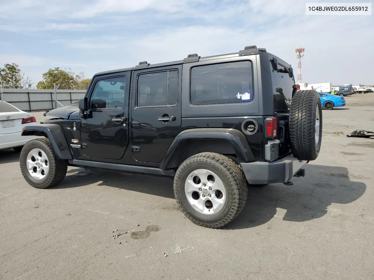 2013 Jeep Wrangler Unlimited Sahara VIN: 1C4BJWEG2DL655912 Lot: 76065334