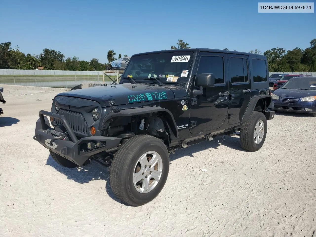 2013 Jeep Wrangler Unlimited Sport VIN: 1C4BJWDG0DL697674 Lot: 76418544