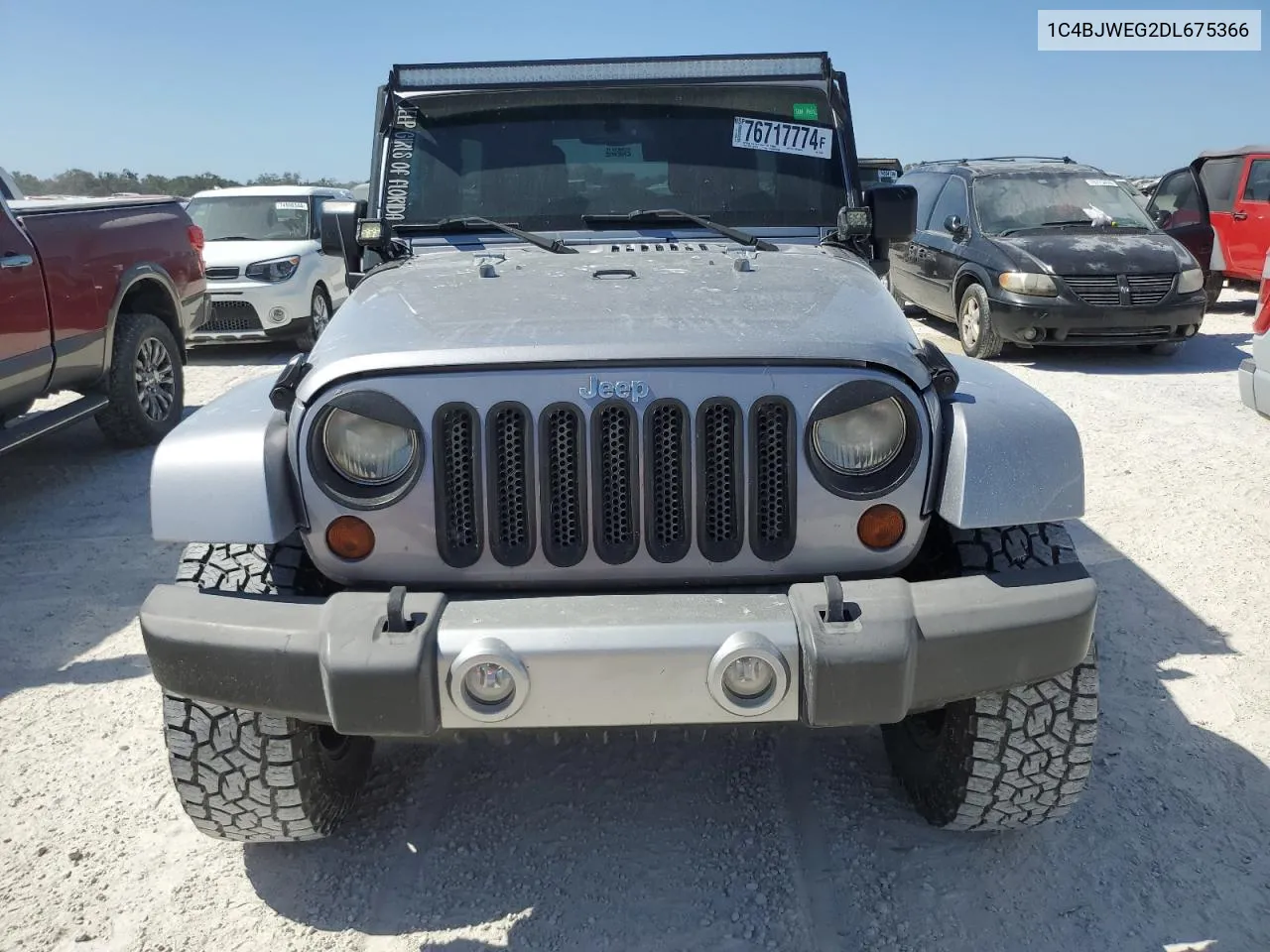 2013 Jeep Wrangler Unlimited Sahara VIN: 1C4BJWEG2DL675366 Lot: 76717774