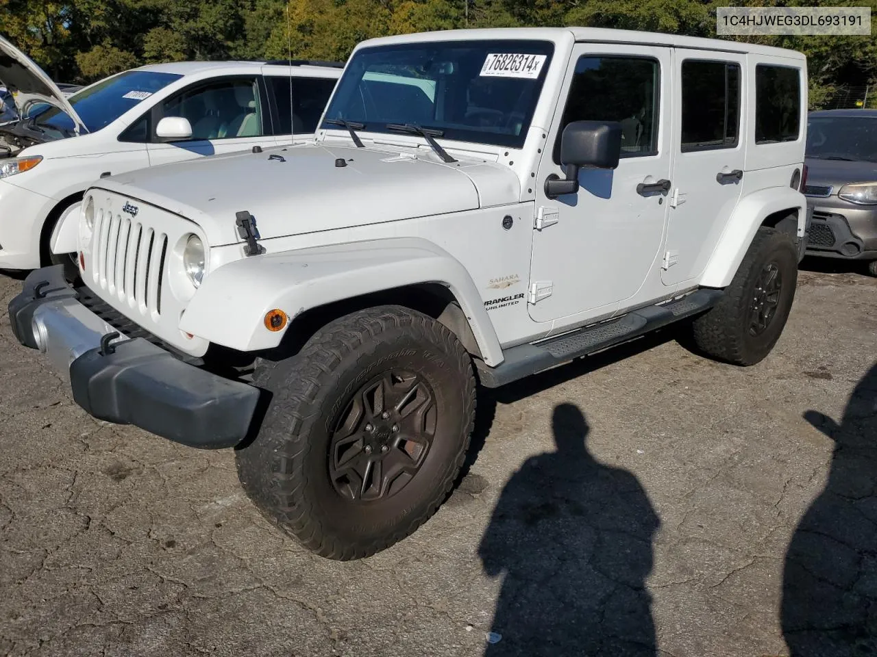 2013 Jeep Wrangler Unlimited Sahara VIN: 1C4HJWEG3DL693191 Lot: 76826314