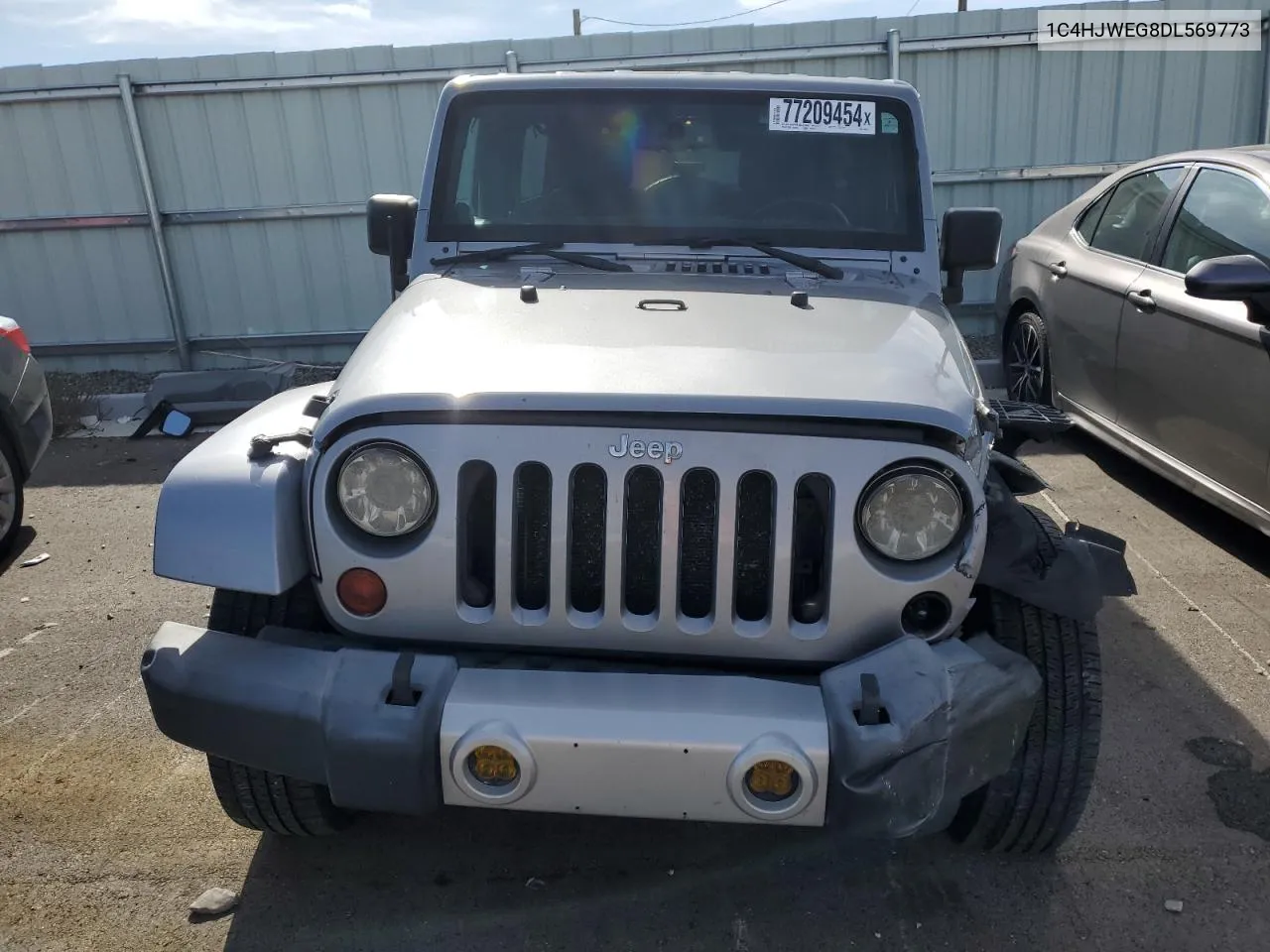 2013 Jeep Wrangler Unlimited Sahara VIN: 1C4HJWEG8DL569773 Lot: 77209454