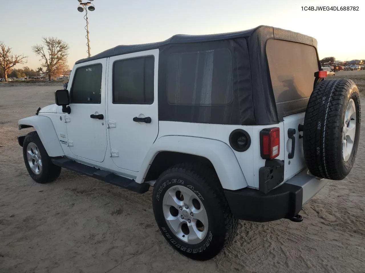 2013 Jeep Wrangler Unlimited Sahara VIN: 1C4BJWEG4DL688782 Lot: 77705354