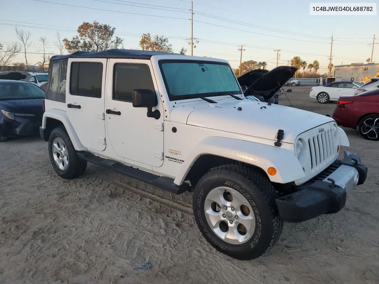 2013 Jeep Wrangler Unlimited Sahara VIN: 1C4BJWEG4DL688782 Lot: 77705354