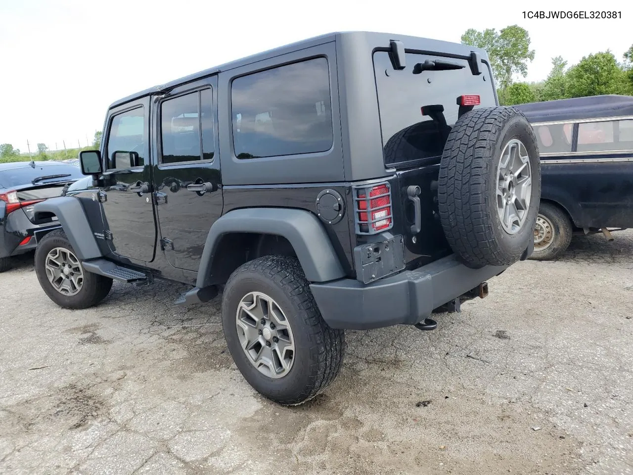 1C4BJWDG6EL320381 2014 Jeep Wrangler Unlimited Sport