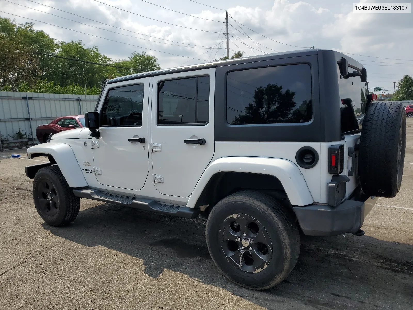 2014 Jeep Wrangler Unlimited Sahara VIN: 1C4BJWEG3EL183107 Lot: 64503814