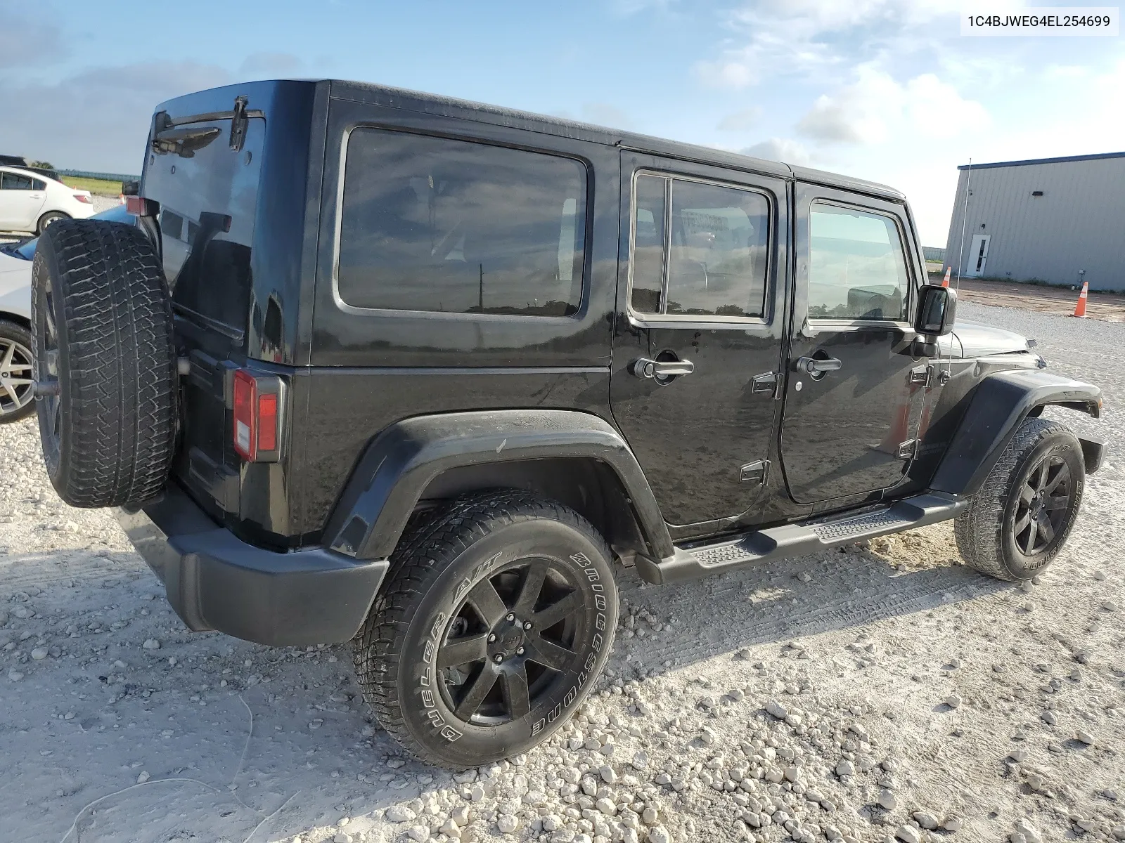 1C4BJWEG4EL254699 2014 Jeep Wrangler Unlimited Sahara