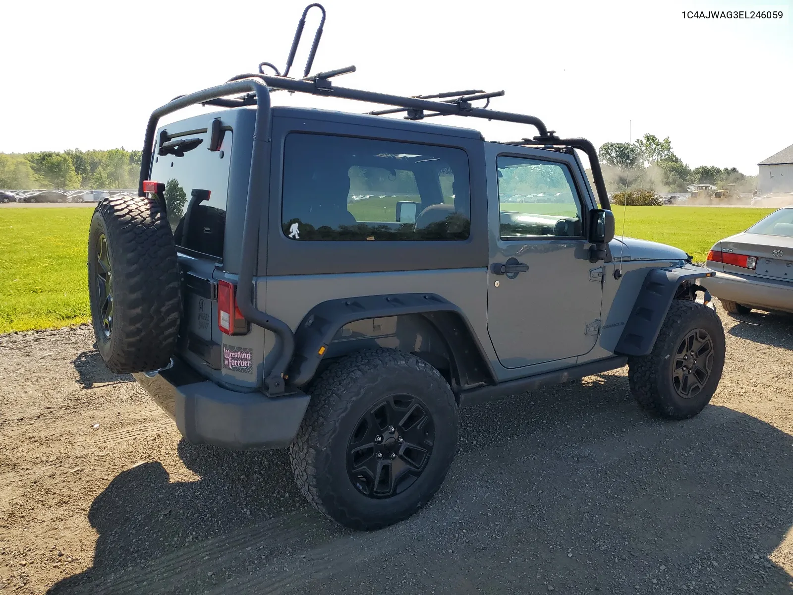 2014 Jeep Wrangler Sport VIN: 1C4AJWAG3EL246059 Lot: 66396524