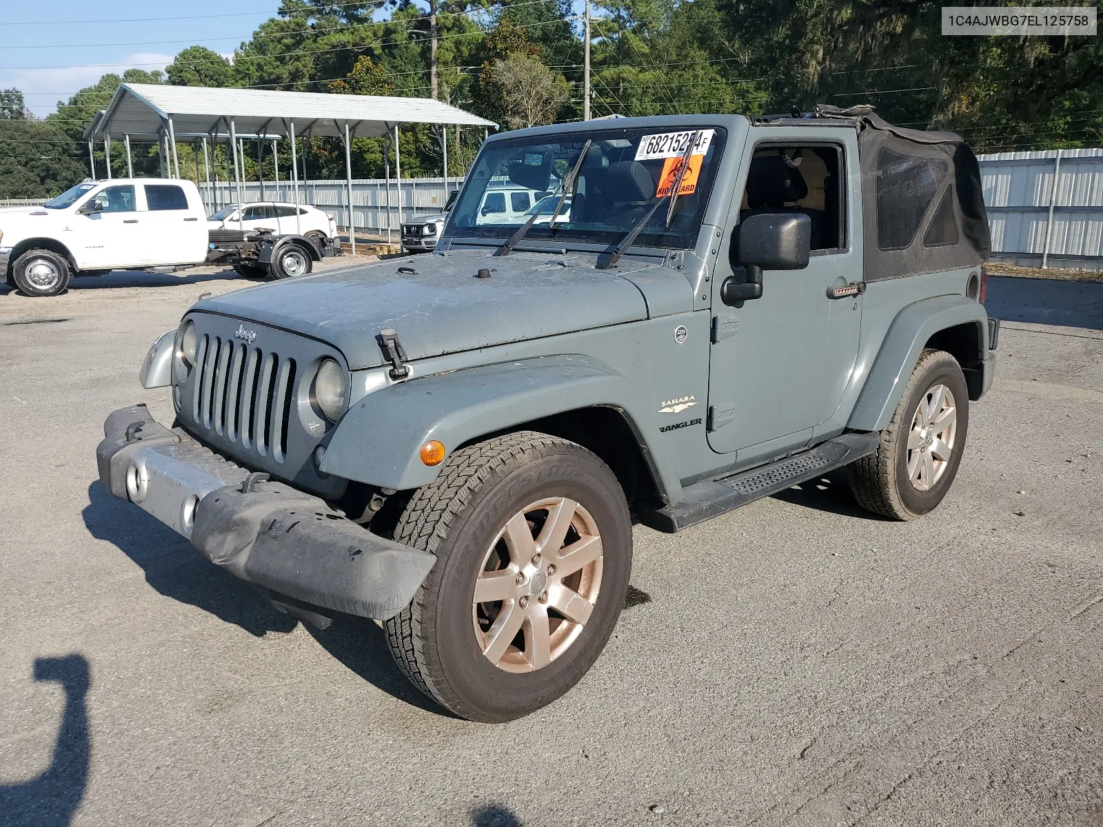 2014 Jeep Wrangler Sahara VIN: 1C4AJWBG7EL125758 Lot: 68215254