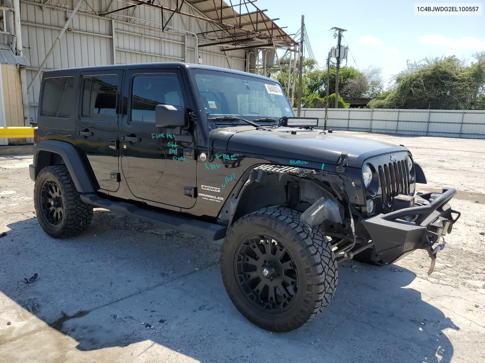 1C4BJWDG2EL100557 2014 Jeep Wrangler Unlimited Sport