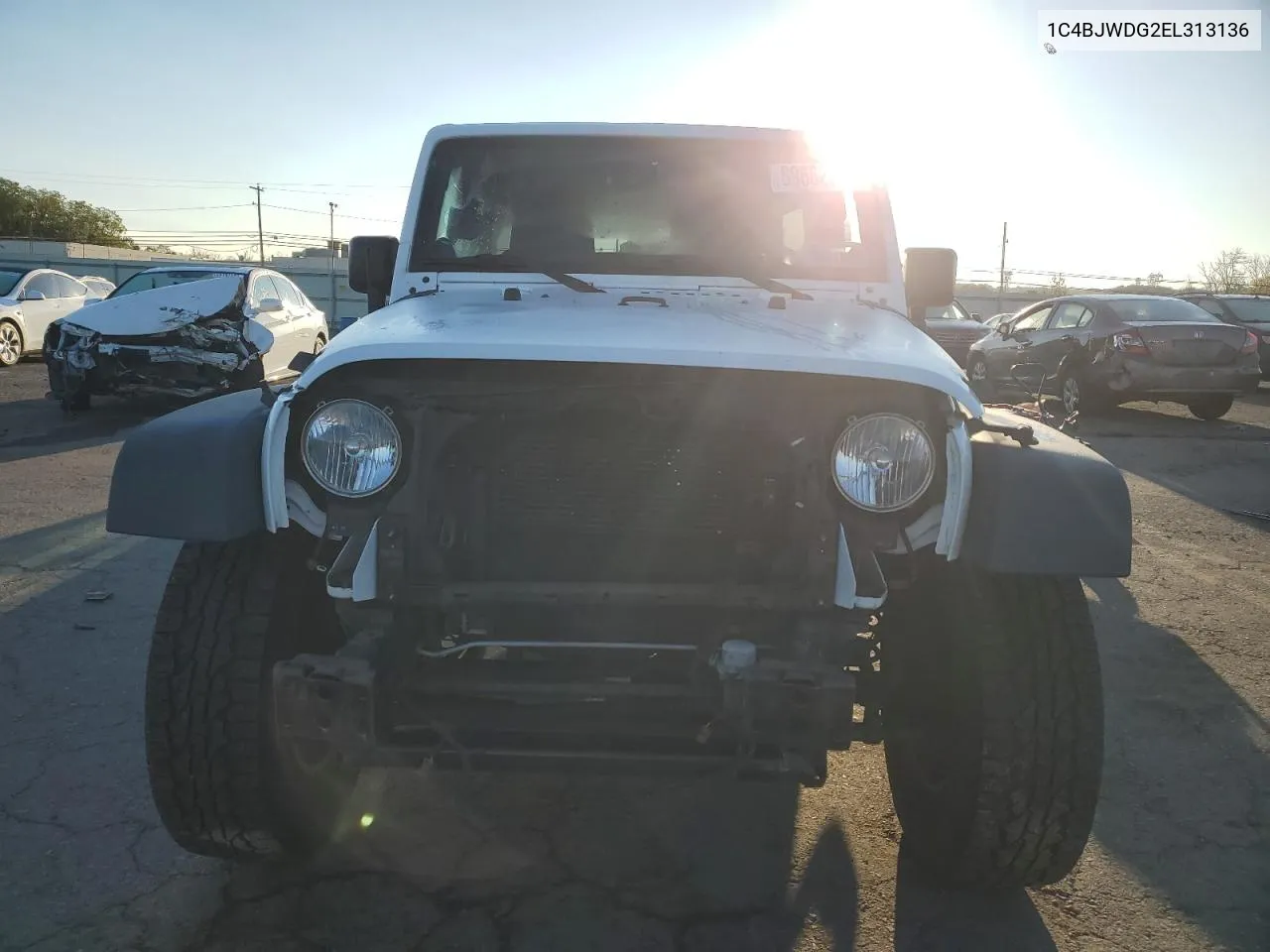 1C4BJWDG2EL313136 2014 Jeep Wrangler Unlimited Sport