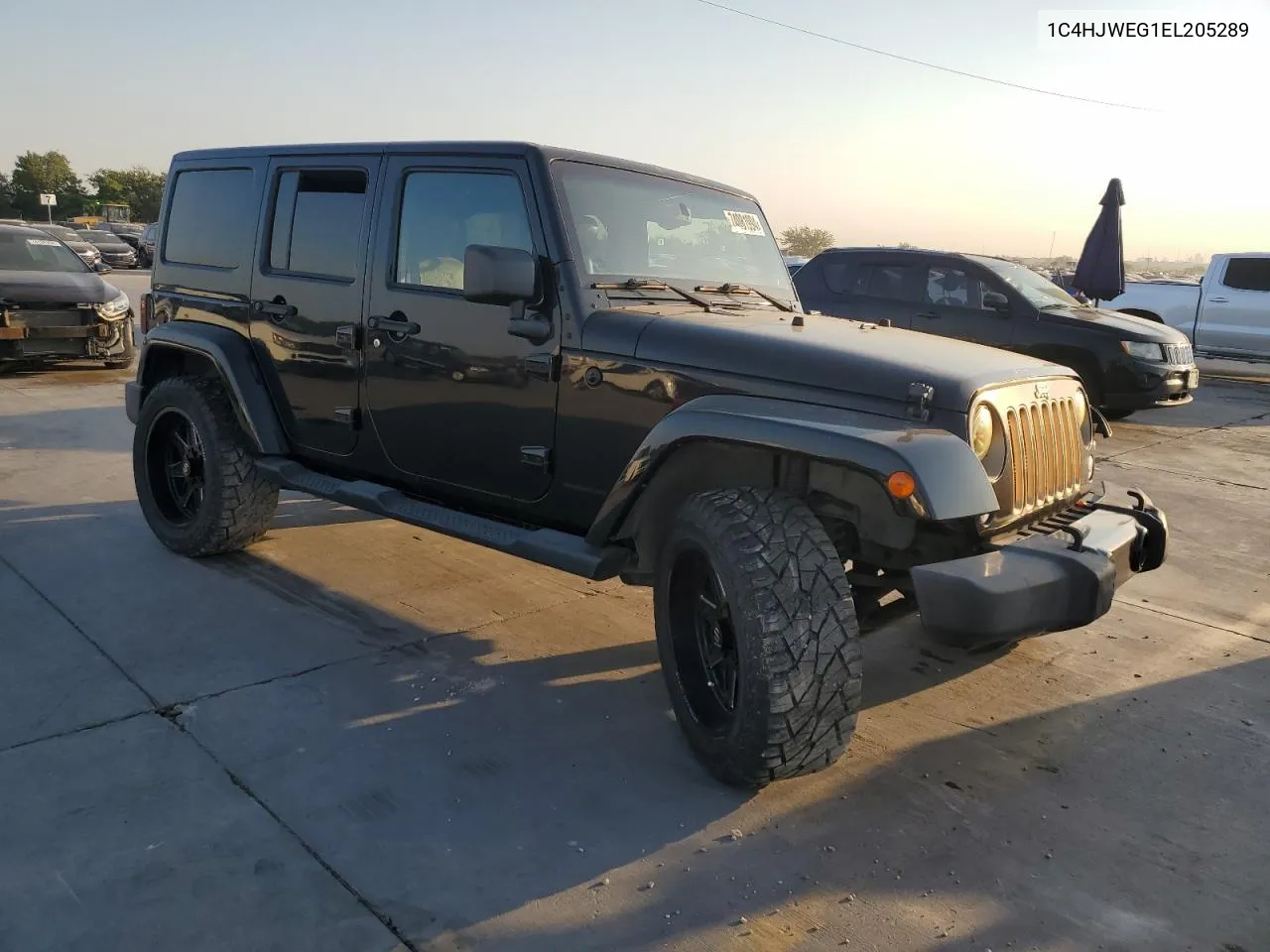 2014 Jeep Wrangler Unlimited Sahara VIN: 1C4HJWEG1EL205289 Lot: 74081994