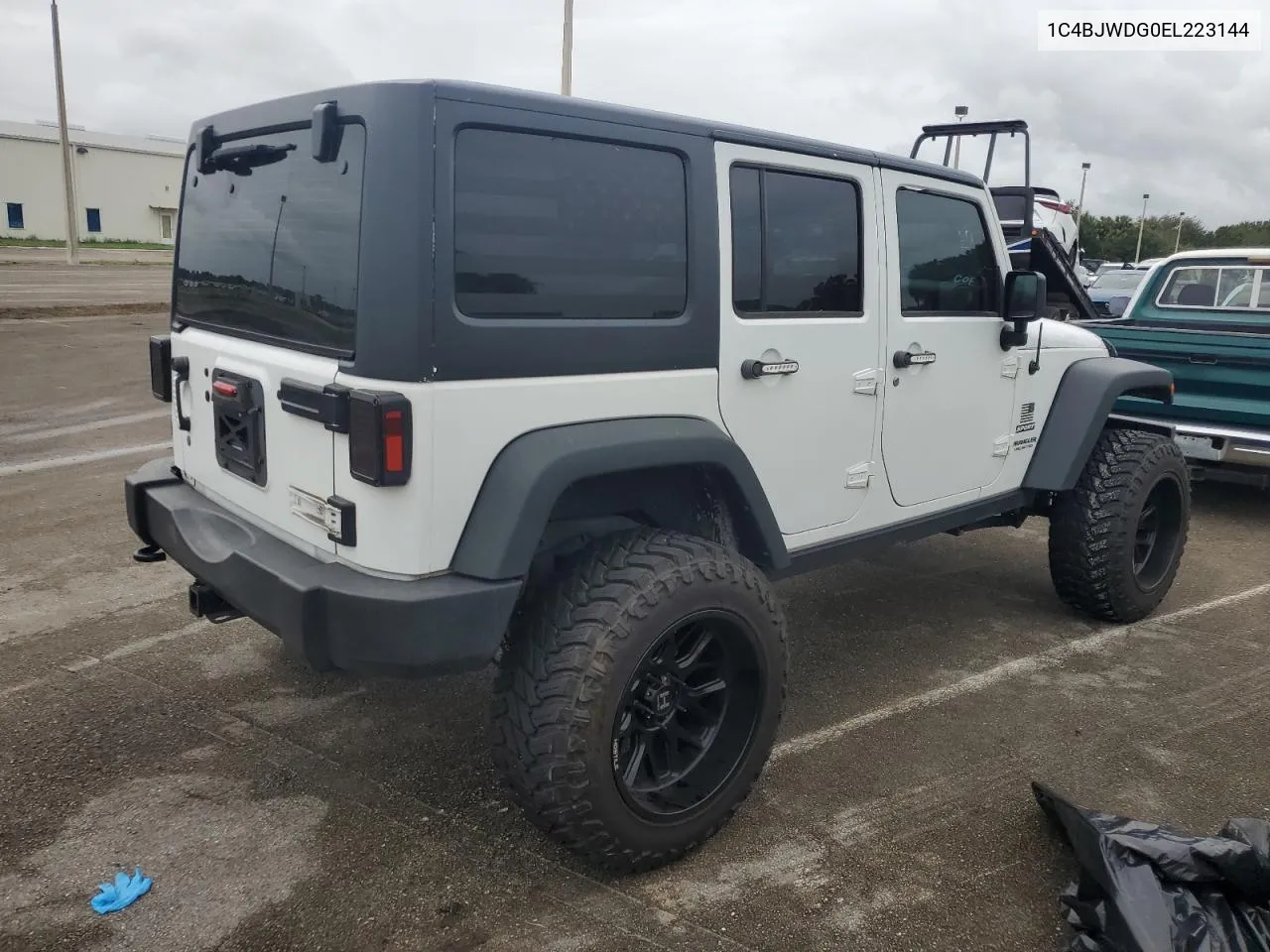 2014 Jeep Wrangler Unlimited Sport VIN: 1C4BJWDG0EL223144 Lot: 74815964