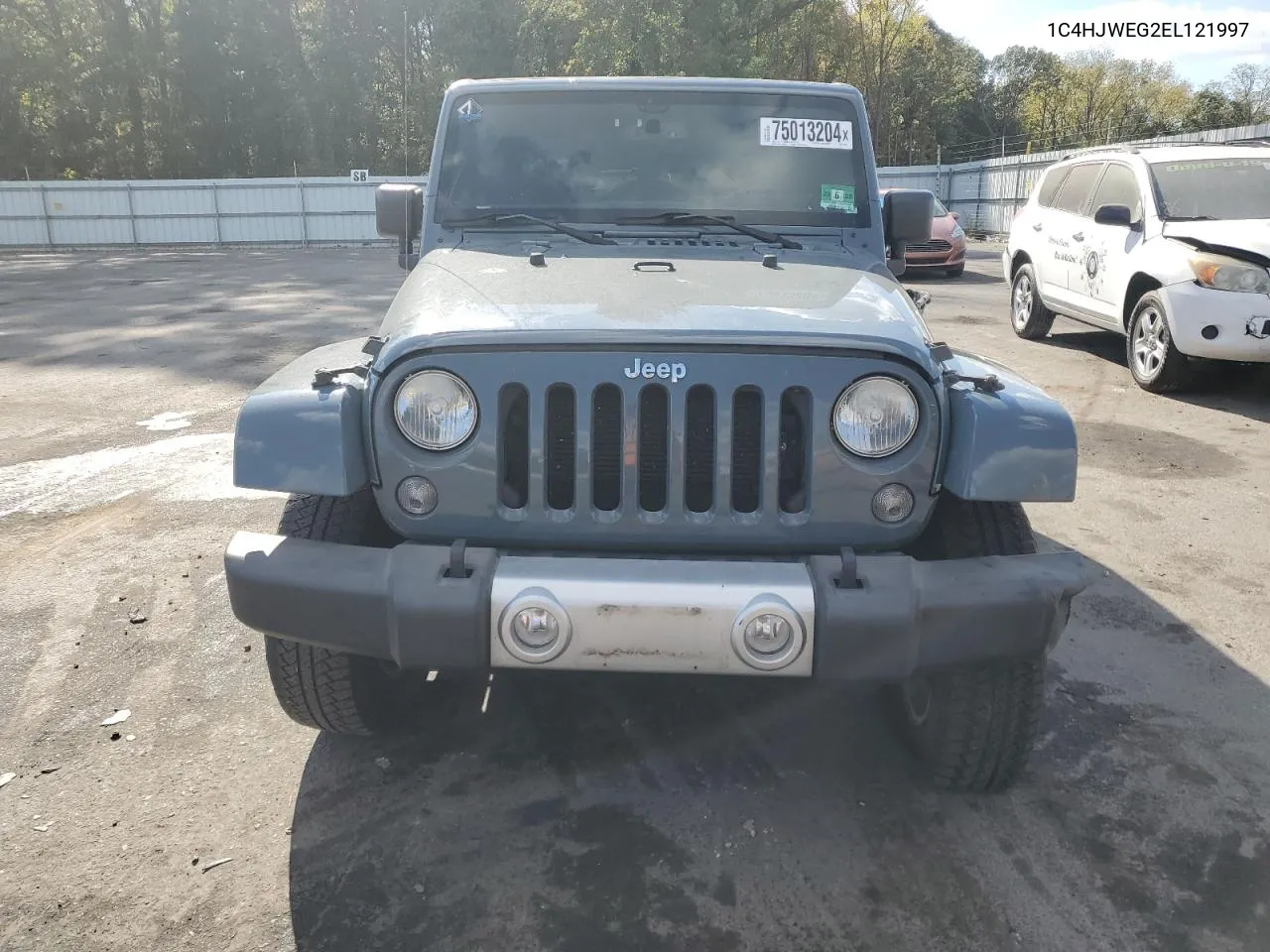 2014 Jeep Wrangler Unlimited Sahara VIN: 1C4HJWEG2EL121997 Lot: 75013204