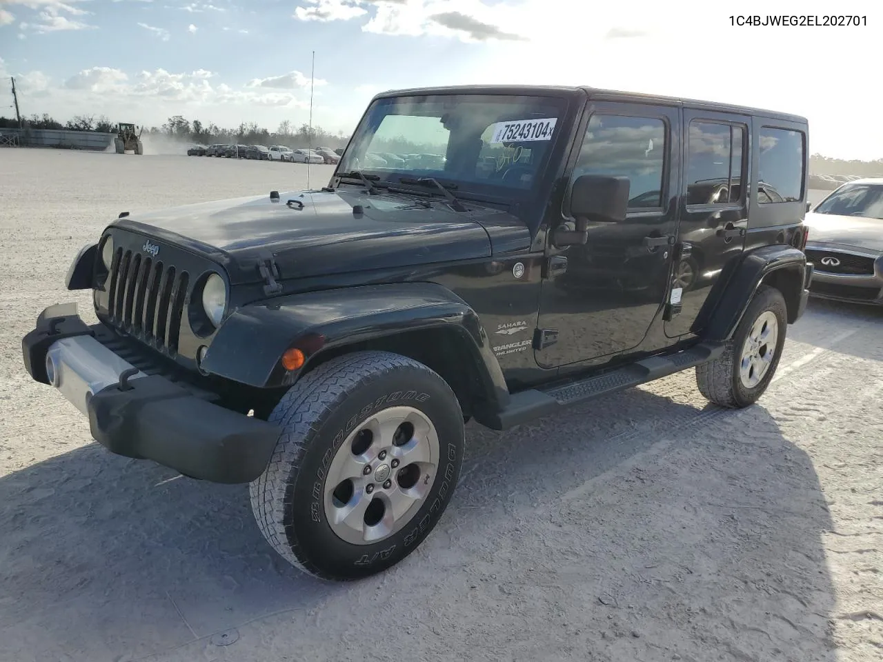 2014 Jeep Wrangler Unlimited Sahara VIN: 1C4BJWEG2EL202701 Lot: 75243104